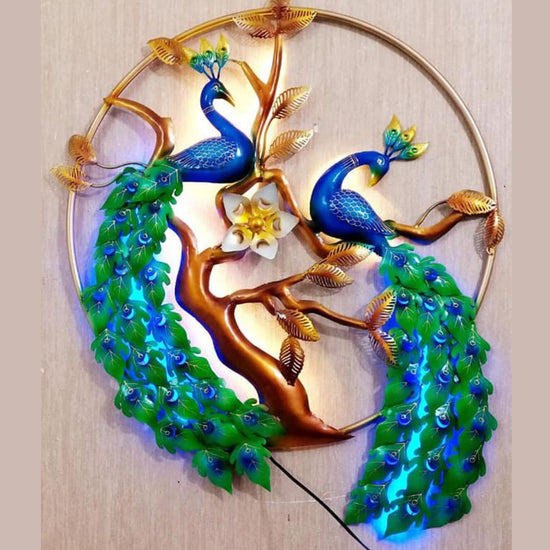 Experience the beauty of nature with our Double Peacock Metal Wall Art. This stunning piece, featuring two intricately crafted peacocks surrounded by nature, will add a touch of elegance to your living room. Measuring <strong>29 x 38 inches</strong>, this metal wall art is the perfect addition to any home decor.</span></li> <li>Made of High-Quality Iron Metal</li> <li>Anti-rust powder coating used for long lasting finish</li> <li>Hanging Mechanism included</li> <li>Peacock wall decor with led lighting