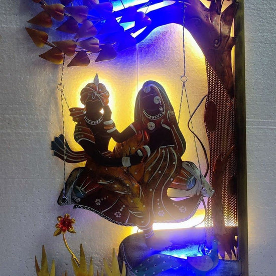 Made of High-Quality Metal Hanging Mechanism included Radhe Krishna Metal wall decor with led lighting Perfect for your living room, bedroom, hall, office reception, guest room, and hotel reception Perfect for living room, bedroom, guest room, hall, office reception The product is packed by professionals for safe delivery SIZE: 20 x 30 Inches Metal Wall Decor by Hansart