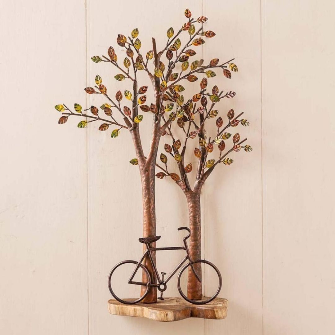 Cycle Under a Tree Metal Wall Art for Living Room (24 x 12 Inches)-Home Decoration-Metal Wall Tree by Hansart Made of Premium-Quality Iron Metal Perfect for your living room, bedroom, hall, office reception, guest room, and hotel reception The product is packed by professionals for safe delivery Designed to make your home look complete "Hansart Made In India because India itself is an art".