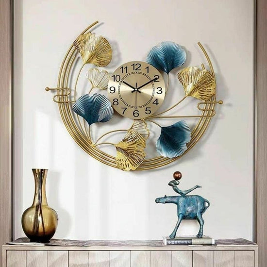 Metal Wall Clock by Hansart Total Wall Coverage Area: 32 x 32 Inches Expertly crafted by artisans in Jodhpur, India Made of Wrought Iron Metal It feature an anti-rust powder coating for a long-lasting finish Finished with a spray paint and lacquer for a smooth and polished look Perfect for your living room, bedroom, hall, office reception, guest room, and hotel reception The product is packed by professionals for safe delivery Designed to make your home look complete