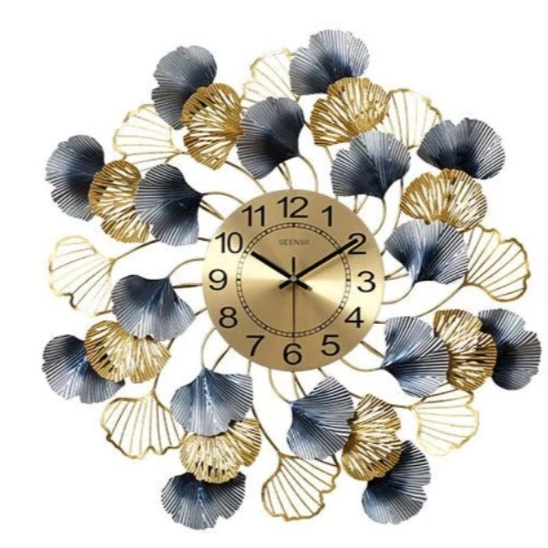 Metal Wall Clock by Hansart Total Wall Coverage Area: 32 x 32 Inches Expertly crafted by artisans in Jodhpur, India Made of Wrought Iron Metal It feature an anti-rust powder coating for a long-lasting finish Finished with a spray paint and lacquer for a smooth and polished look Perfect for your living room, bedroom, hall, office reception, guest room, and hotel reception The product is packed by professionals for safe delivery Designed to make your home look complete